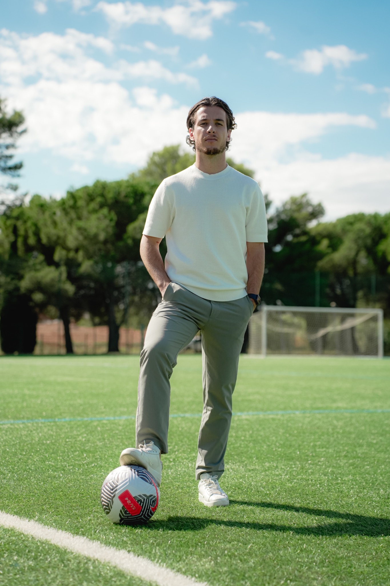 Tom Di Lorenzo on a football field